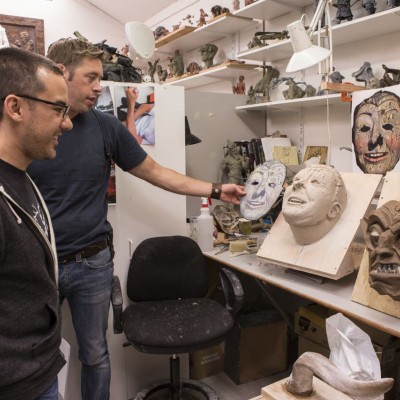 Director Michael Dougherty and Workshop Supervisor Rob Gillies review Dark Elf masks.