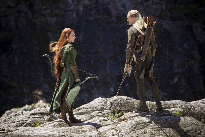 Tauriel (Evangeline Lilly) and Legolas (Orlando Bloom) take stock