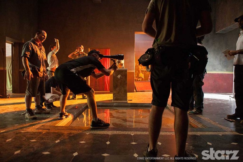 Camera operator Peter McCaffrey lines up a shot